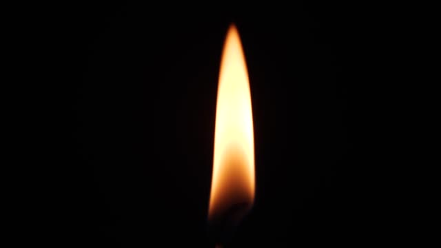 Close up single candle flame