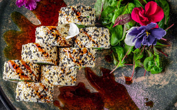 istock sushi roll with cream cheese, cucumber and eel in plate 1225601597