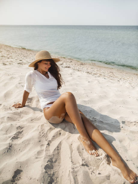 istock Woman Resting on the Beach During Vacation 1225601818