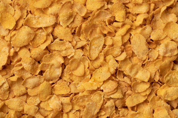 traditionelle cornflakes aus nächster nähe - cornflakes stock-fotos und bilder