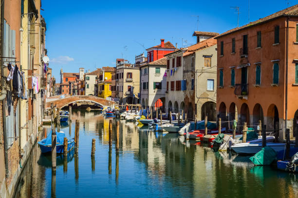 Chioggia, town in venetian lagoon, water canal and boats. Veneto, Italy, Europe. stock photo