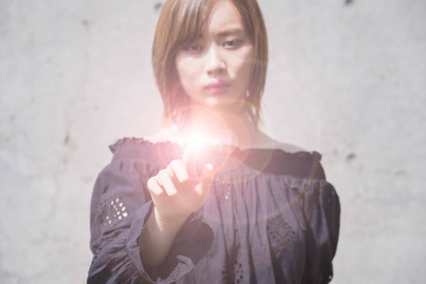 istock Asian young woman putting her index finger 1225607709