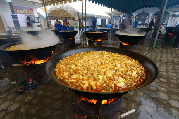 Residents cook Beulangong Kuah in large quantities towards the end of Ramadan in Banda Aceh (05-17-2020). Kuwah beulangöng (culinary from meat), is a kind of Aceh cuisine curry made from the main raw