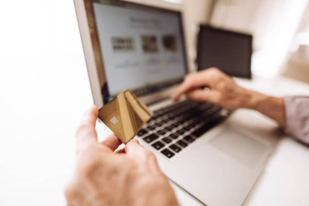 istock business man doing shopping online at home 1225608872