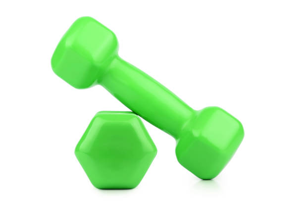 istock Green dumbbells isolated on white background 1225610462