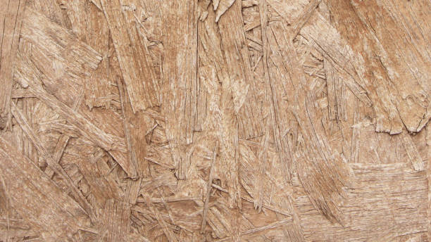 roh flache osb-board in makro - holz strukturierte board in vektor mit sichtbaren scharfen abgeflachten holzkomponenten - schöne natürliche mehrschichtige chaotische hintergrund - macro backgrounds abstract dirty stock-grafiken, -clipart, -cartoons und -symbole