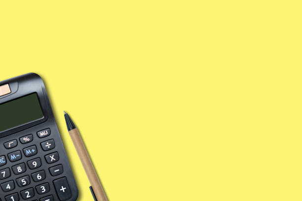 istock top view of recycled pen with calculator 1225613160