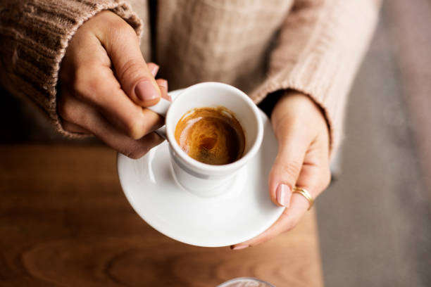 Coffee Cup, Lady's hands holding Coffee Cup, Woman holding a white mug, Espresso in white cup Coffee - Drink, Cup, Mug, Cafe, Directly Above, Frothy Drink, hand, Women, One Woman Only, Holding, Coffee Cup, Latte, Cappuccino, espresso, tea, cup of tea hands stock pictures, royalty-free photos & images