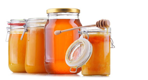 istock Composition with large jars of honey 1225616943