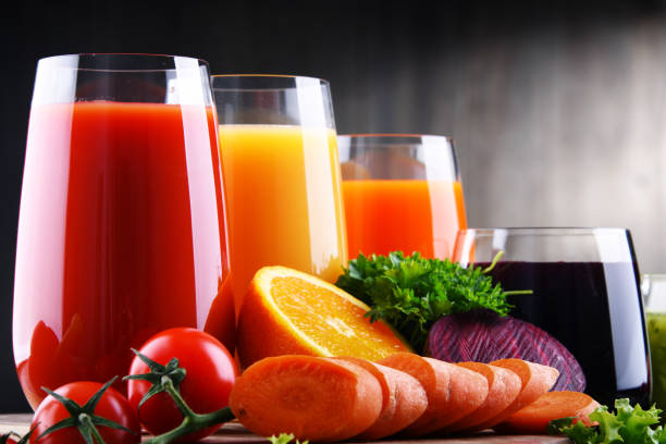 istock Glasses with fresh organic vegetable and fruit juices 1225618277