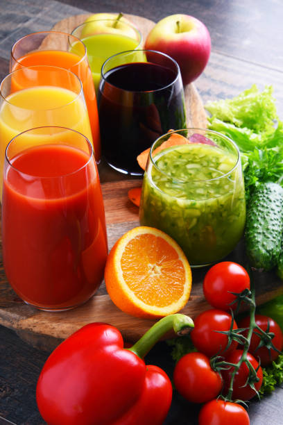 istock Glasses with fresh organic vegetable and fruit juices 1225618384