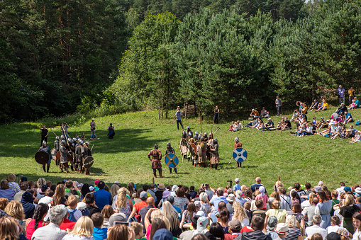 Kernave, Lithuania - July 7, 2018: Reconstruction of the medieval battle during the popular festival Days of Live Archeology in Kernave, ancient capital of Lithuania.
