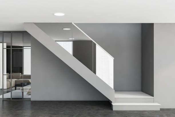 istock Stairs in gray living room interior 1225626363