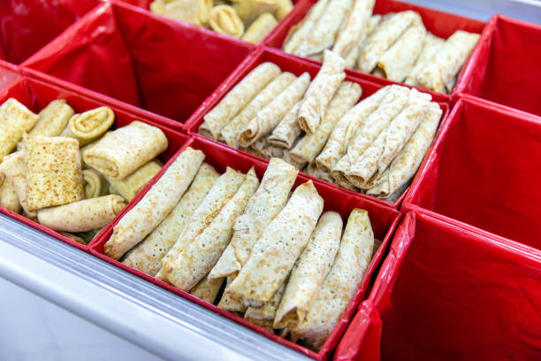 Frozen pancakes with meat on showcase in the store