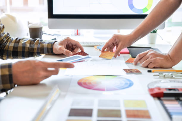 istock Team design of young Interior graphic designer working house project sketching on graphic tablet and color swatch working at modern office, creative inspiration and imagine 1225631934