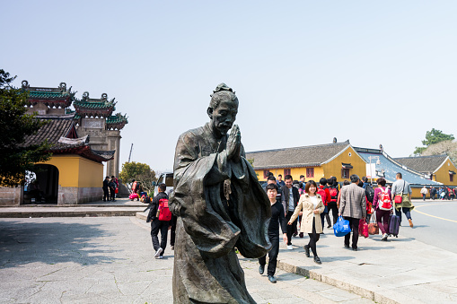 Statue of pilgrim at the Mount Luojia, which lies in the Lotus Sea to the southeast of Putuo Mountain, Zhoushan, Zhejiang, the place where Bodhisattva Guanyin practiced Buddhism
