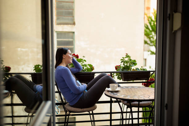 istock Woman reading book an enjoying 1225637326