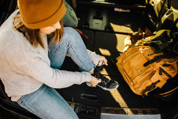 istock Young female hiker getting ready for adventure 1225638613