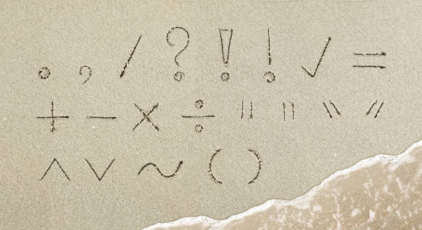 istock Punctuation mark handwritten in the sand on the beach 1225639763