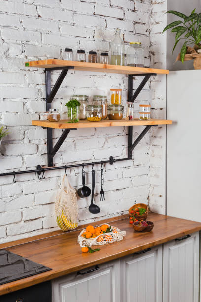 istock interior of modern kitchen white brick wall zero waste concept glass jars mesh reuse bag 1225641974