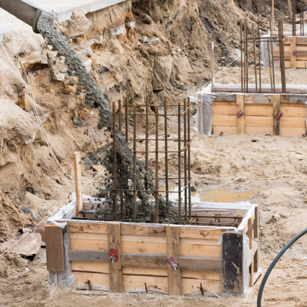 istock The process of pouring concrete into the formwork with rebar. Construction site, details. 1225647252