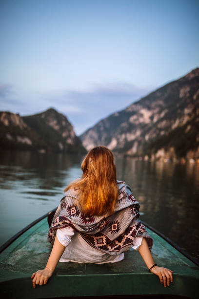 istock Enjoying in view on small boat on lake 1225647346