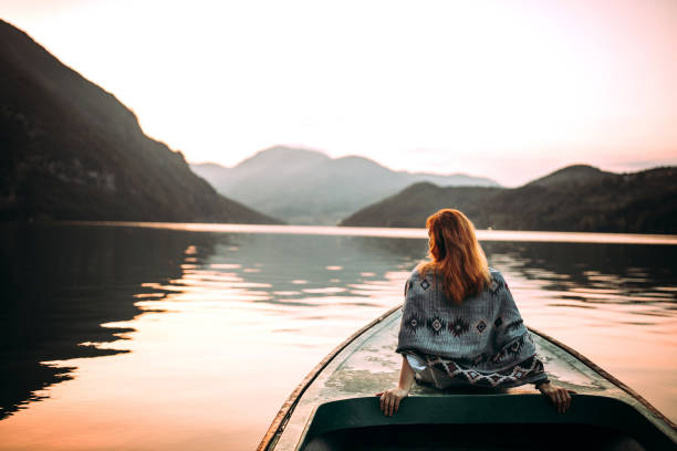 istock Enjoying in view on small boat on lake 1225647662