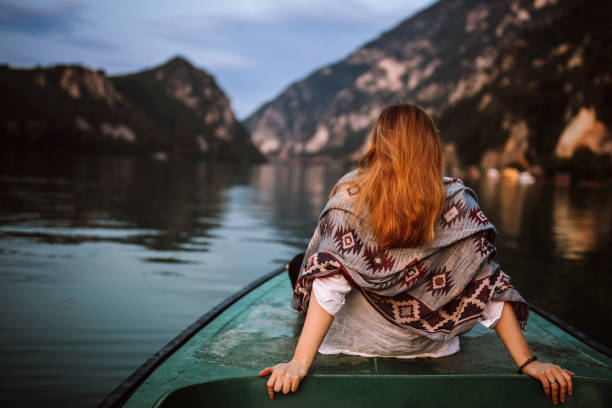 istock Enjoying in view on small boat on lake 1225647720