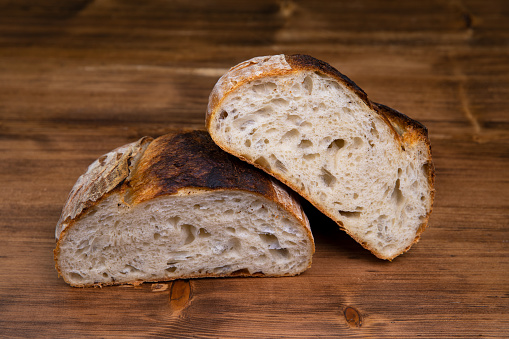 homemade sourdough bread on wooden background