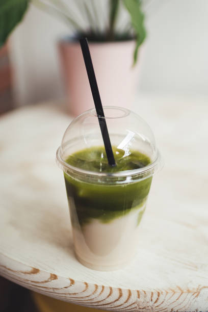 istock Coconut milk matcha drink with ice 1225652703