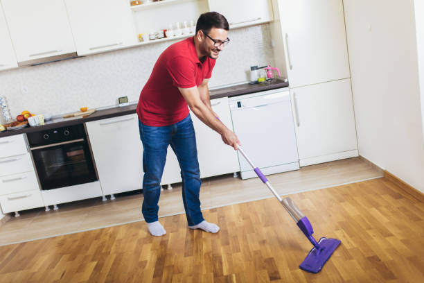 istock Man mopping the floor in his kitchen. 1225652866