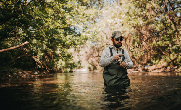 istock Fly Fisherman looking bait 1225653875