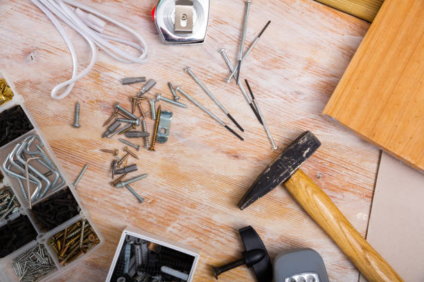 Set of hand tools on wooden background