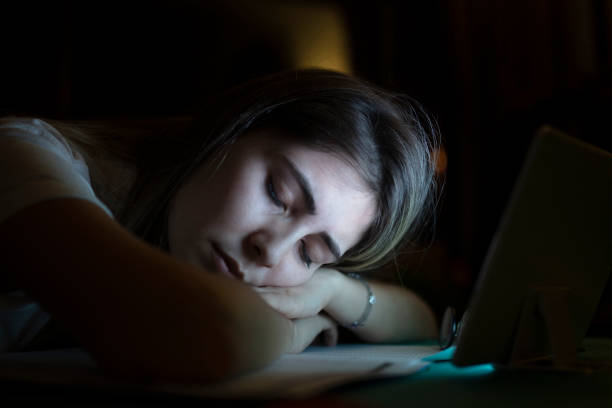 istock young business woman falls asleep while working overtime 1225657344