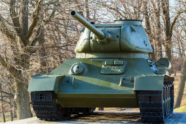 Vintage soviet tank T-34 on a pedestal front view