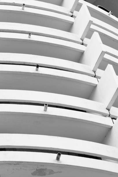 istock Abstract black and white photo of a white old architectural structure 1225659180