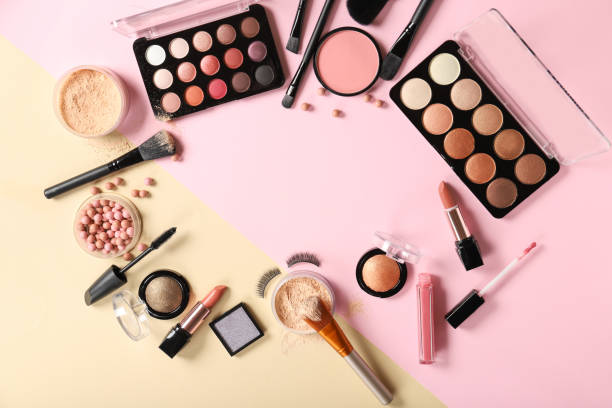 istock Frame from decorative cosmetics on a colored background. Place for text 1225662615