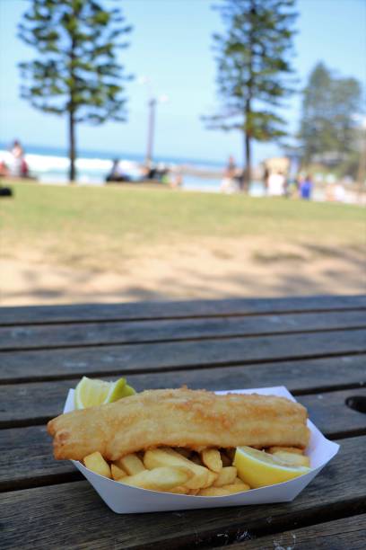 Fish and Chips at the beach in Australia stock photo