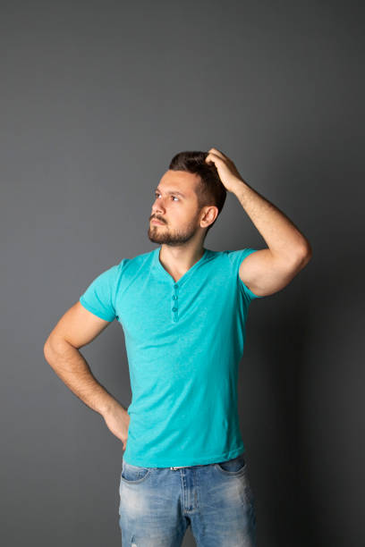 istock Young man in front of blackboard 1225664821
