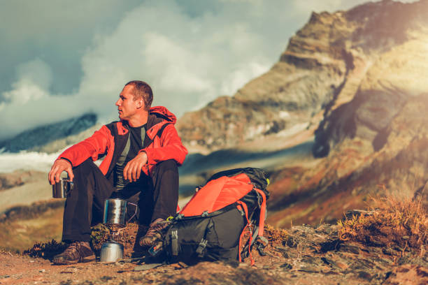 istock Male Hiker Resting After Walking Long Distance. 1225668559