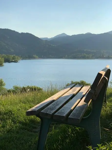 Bench in front of the Tegernsee, hill, with a view of the Kampen and the Wiesseer mountains, evening atmosphere, Point, Tegernsee, Upper Bavaria