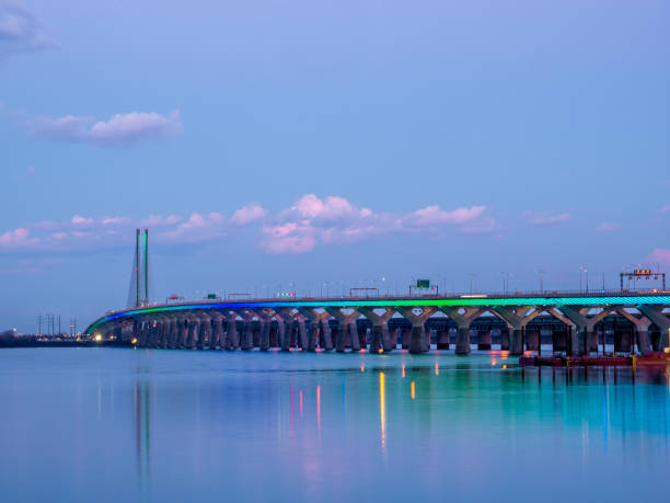 istock The Samuel De Champlain Bridge linking Montreal with the south shore is illuminated in rainbow colors on the Saint Lawrence River. 1225684564