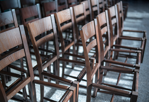 Group of objects wooden chairs after polish in factory.