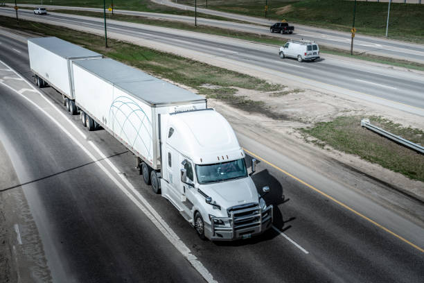 istock truck on the highway 1225688820