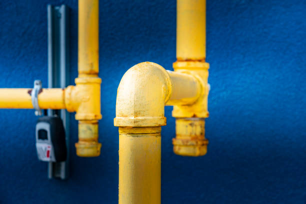 istock Gas piping entering the building wall 1225688918