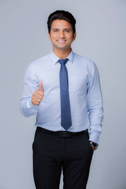 young indian businessman - stock photo - thumbs up business people isolated imagens e fotografias de stock