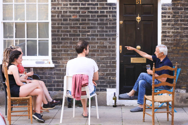 Coronavirus outbreak in the UK London, England - May 08, 2020. Members of the public celebrate VE DAY 75 in the neighborhood central London, following the guidance of authorities on social distancing Waterloo, London. ve day celebrations uk stock pictures, royalty-free photos & images