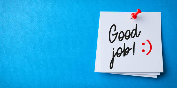 istock White Sticky Note With Good Job And Red Push Pin On Blue Background 1225696310