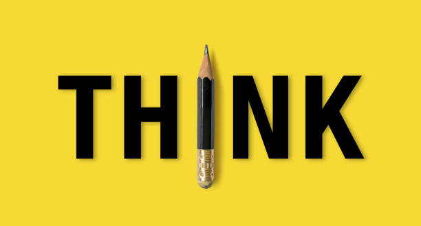 istock Black colour pencil with word meaning THINK on yellow background. Creativity inspiration ideas concept 1225696381