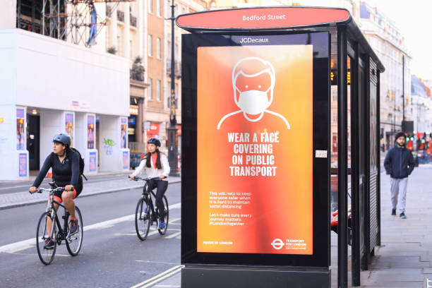 epidemia di coronavirus nel regno unito - bicycle london england cycling safety foto e immagini stock